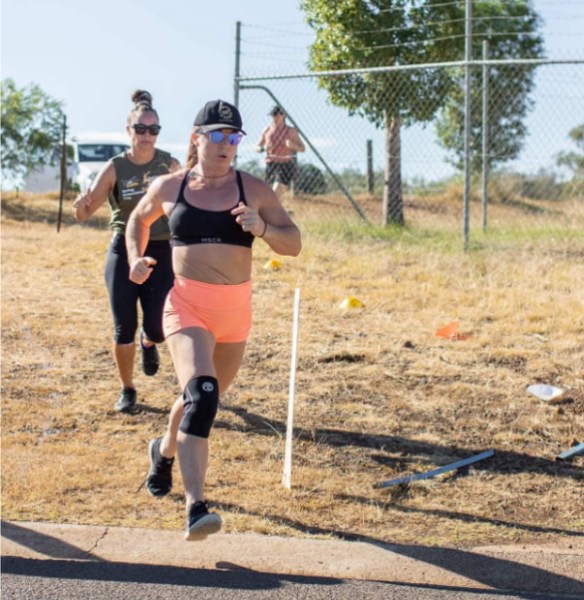 Naomi Lewin running during a fitness competition