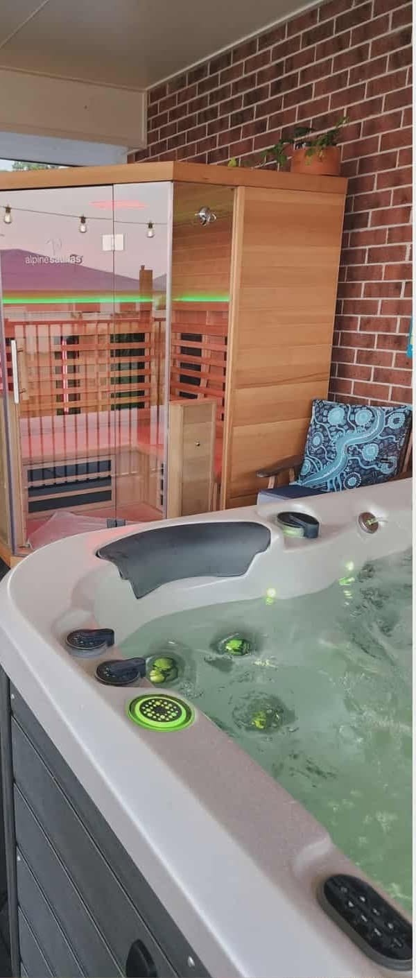 The infrared sauna and hydrotherapy mineral spa on the deck at Harmonic Living